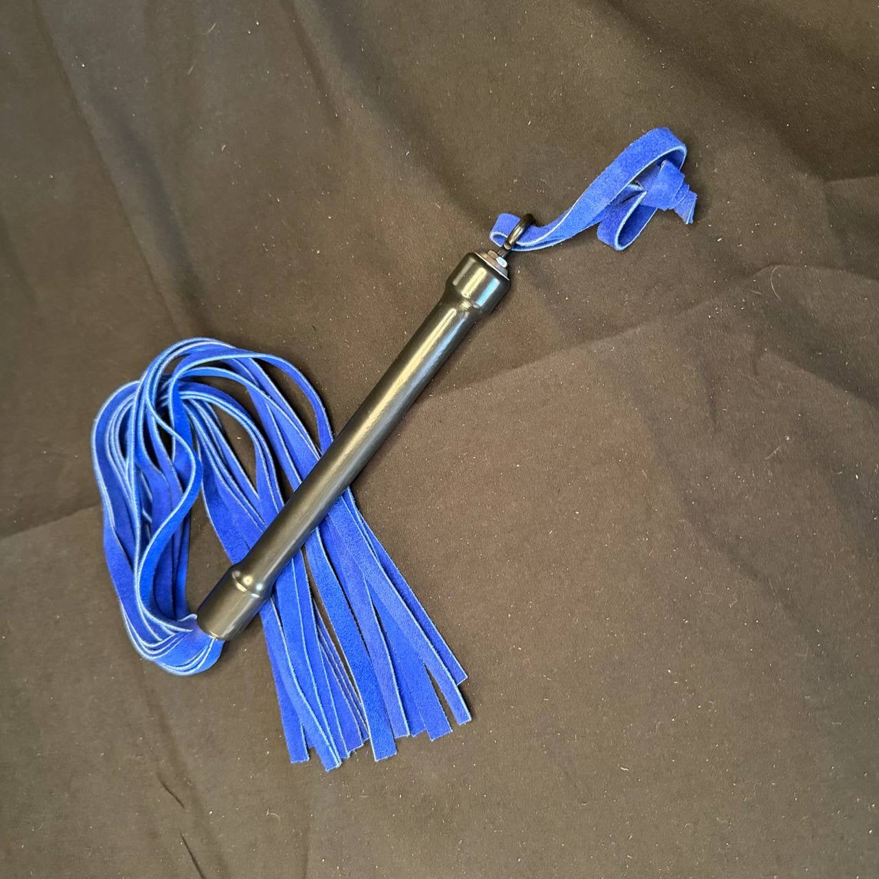 Royal blue suede rubber handled flogger